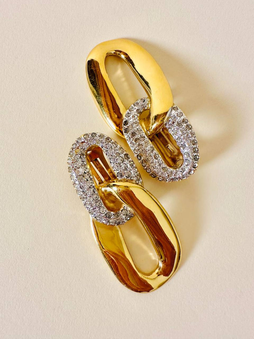 Maxi clip oro a catena con strass  “Yves Saint Laurent”