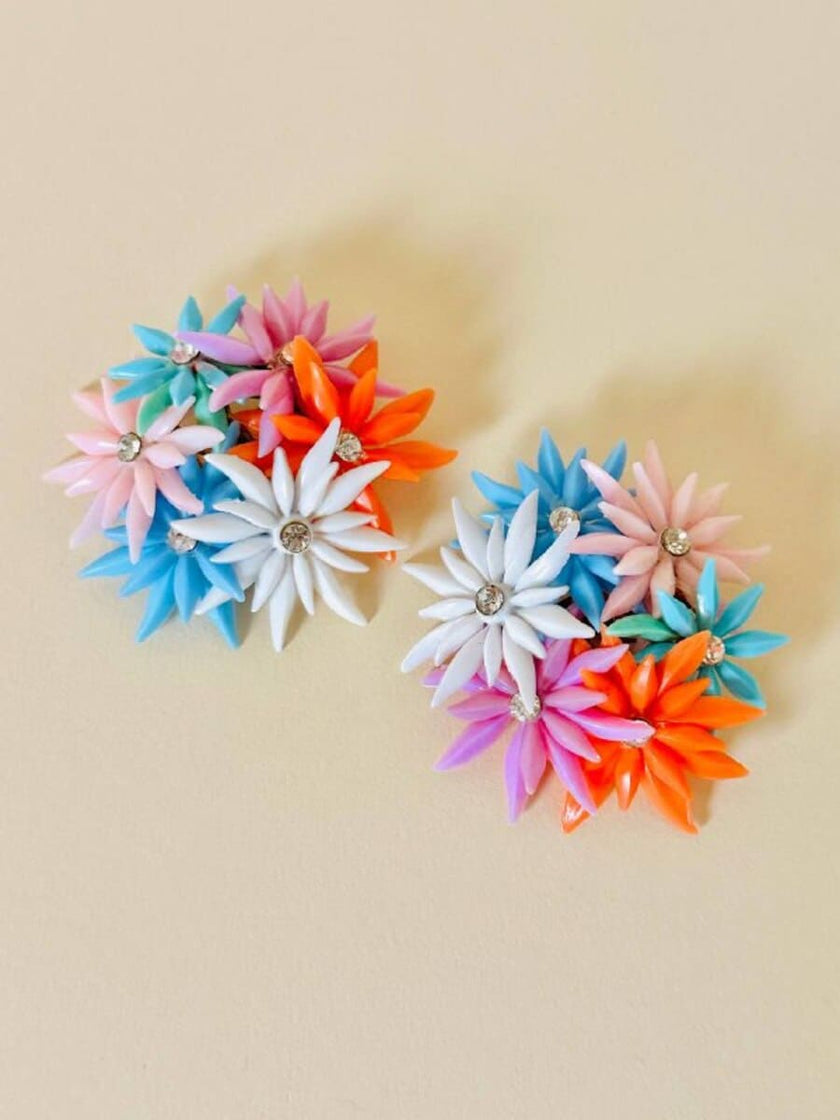 Maxi clip con fiori multicolor e strass
