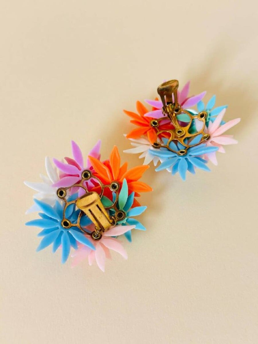 Maxi clip con fiori multicolor e strass