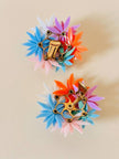 Maxi clip con fiori multicolor e strass