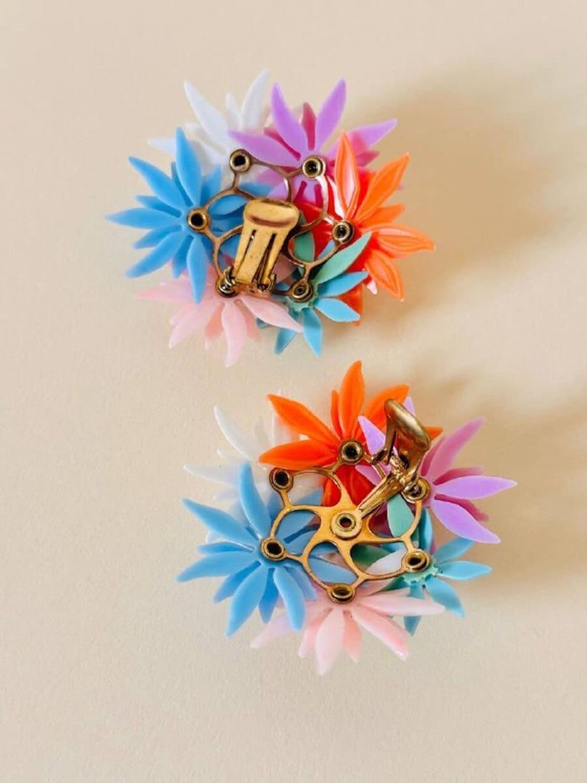Maxi clip con fiori multicolor e strass