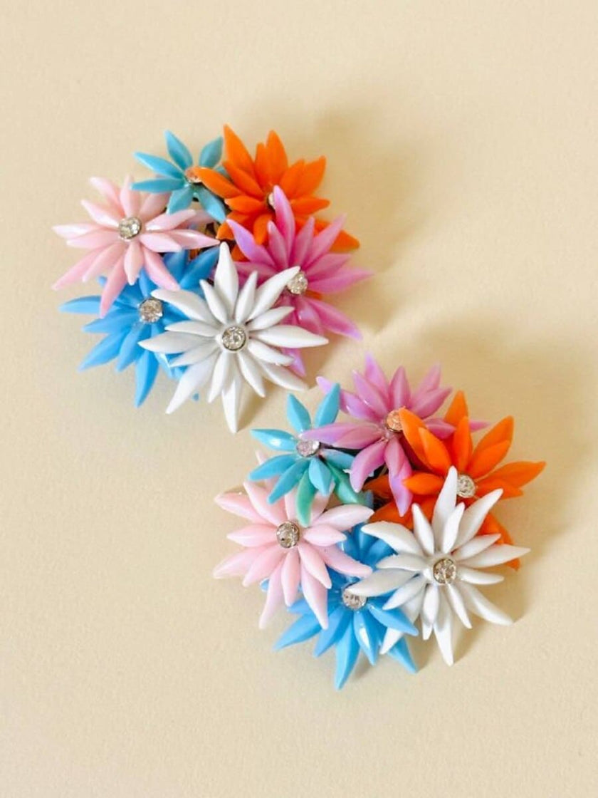 Maxi clip con fiori multicolor e strass