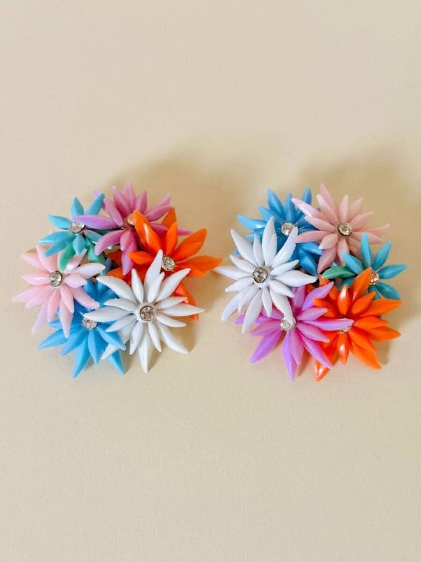 Maxi clip con fiori multicolor e strass
