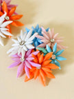 Maxi clip con fiori multicolor e strass