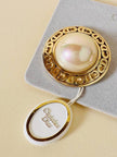 Maxi clip dorate con perle cabochon “Christian Dior”