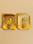 Maxi clip oro con logo “Yves Saint Laurent”
