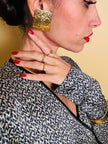 Maxi clip oro con logo “Yves Saint Laurent”