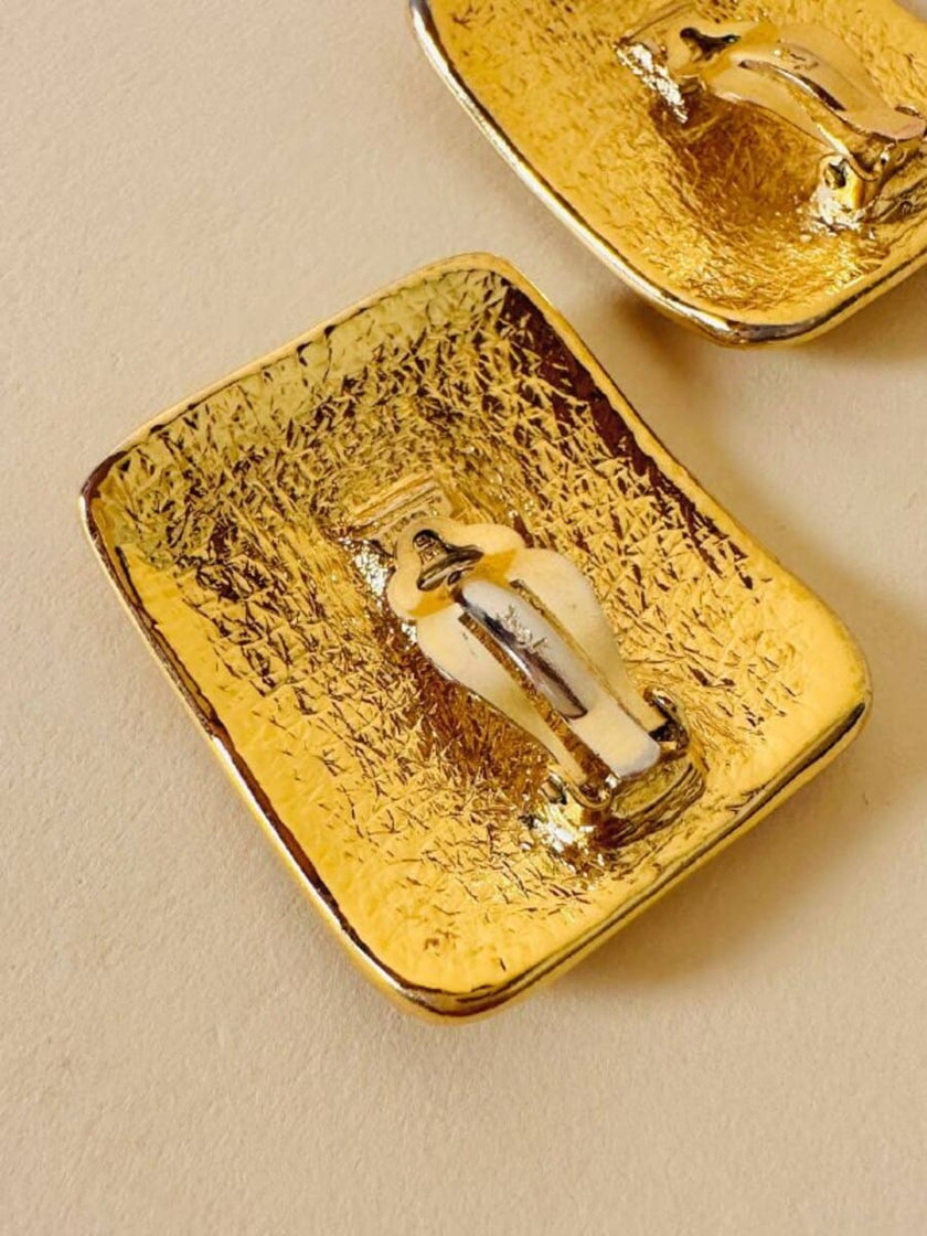 Maxi clip oro con logo “Yves Saint Laurent”