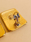 Maxi clip oro con logo “Yves Saint Laurent”