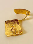Maxi clip oro con logo “Yves Saint Laurent”