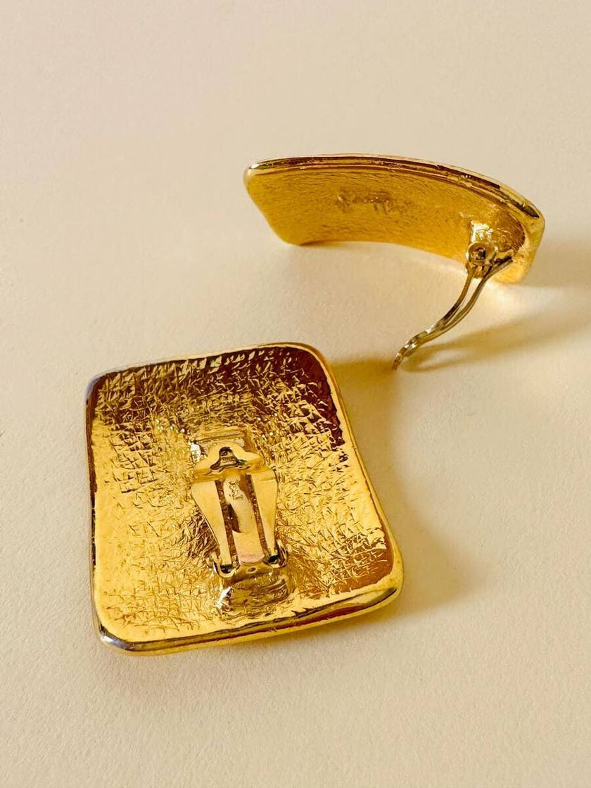 Maxi clip oro con logo “Yves Saint Laurent”