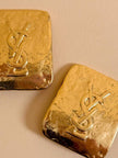 Maxi clip oro con logo “Yves Saint Laurent”