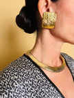 Maxi clip oro con logo “Yves Saint Laurent”