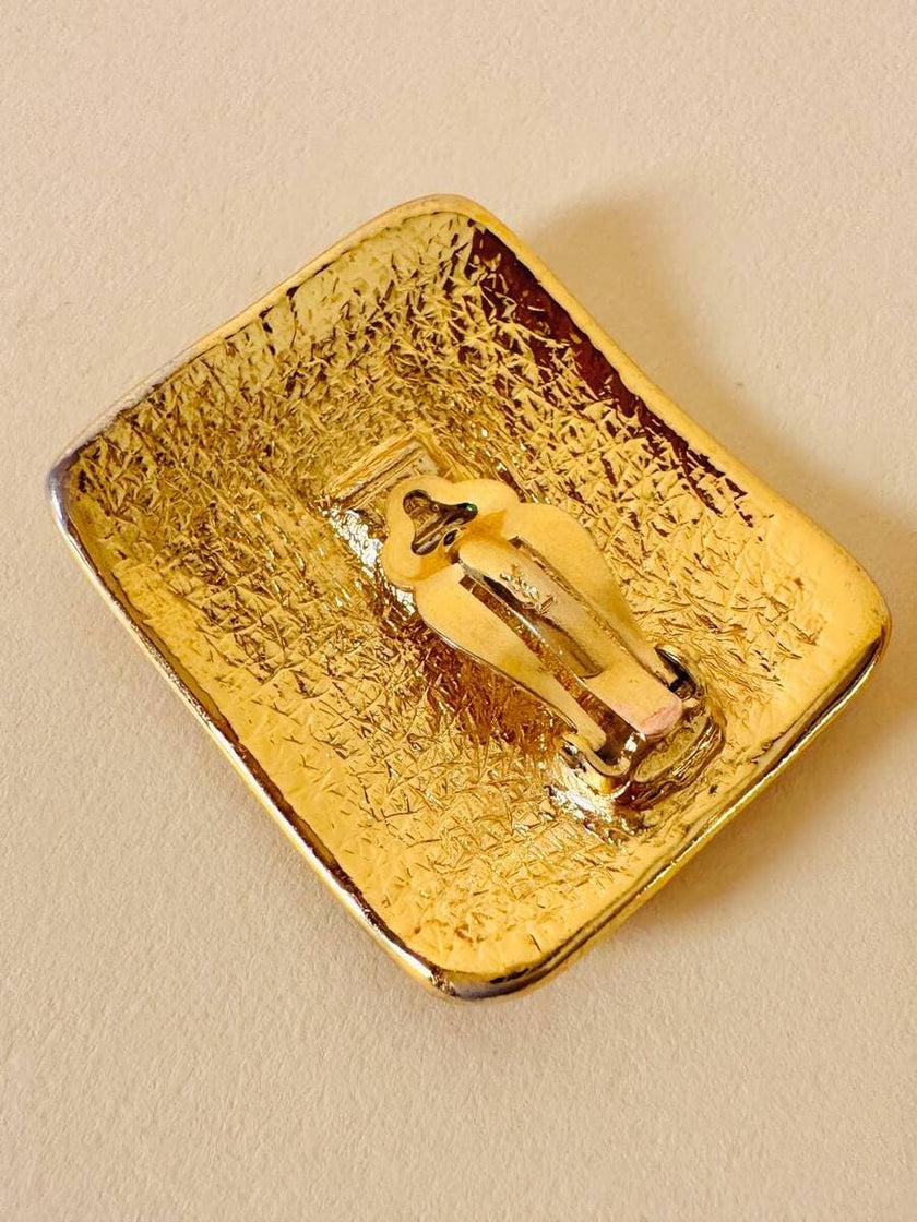 Maxi clip oro con logo “Yves Saint Laurent”