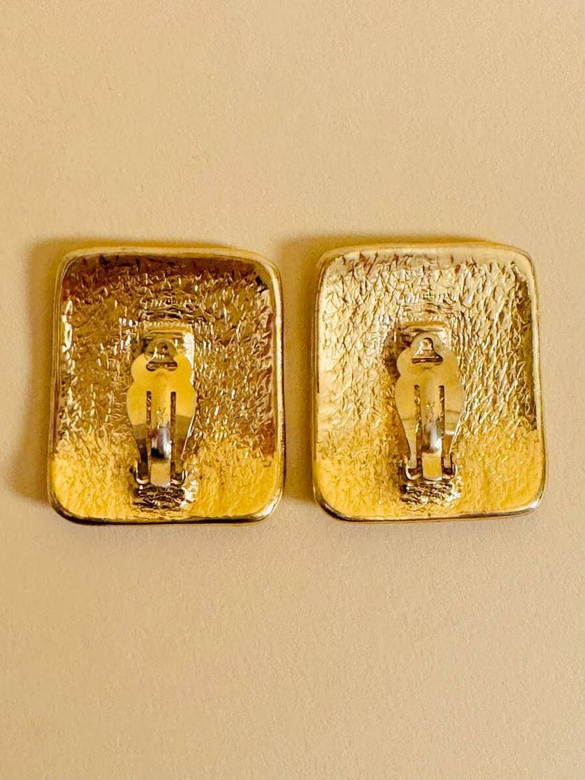 Maxi clip oro con logo “Yves Saint Laurent”