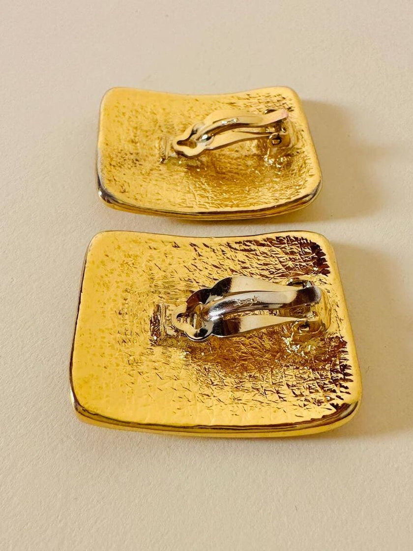 Maxi clip oro con logo “Yves Saint Laurent”