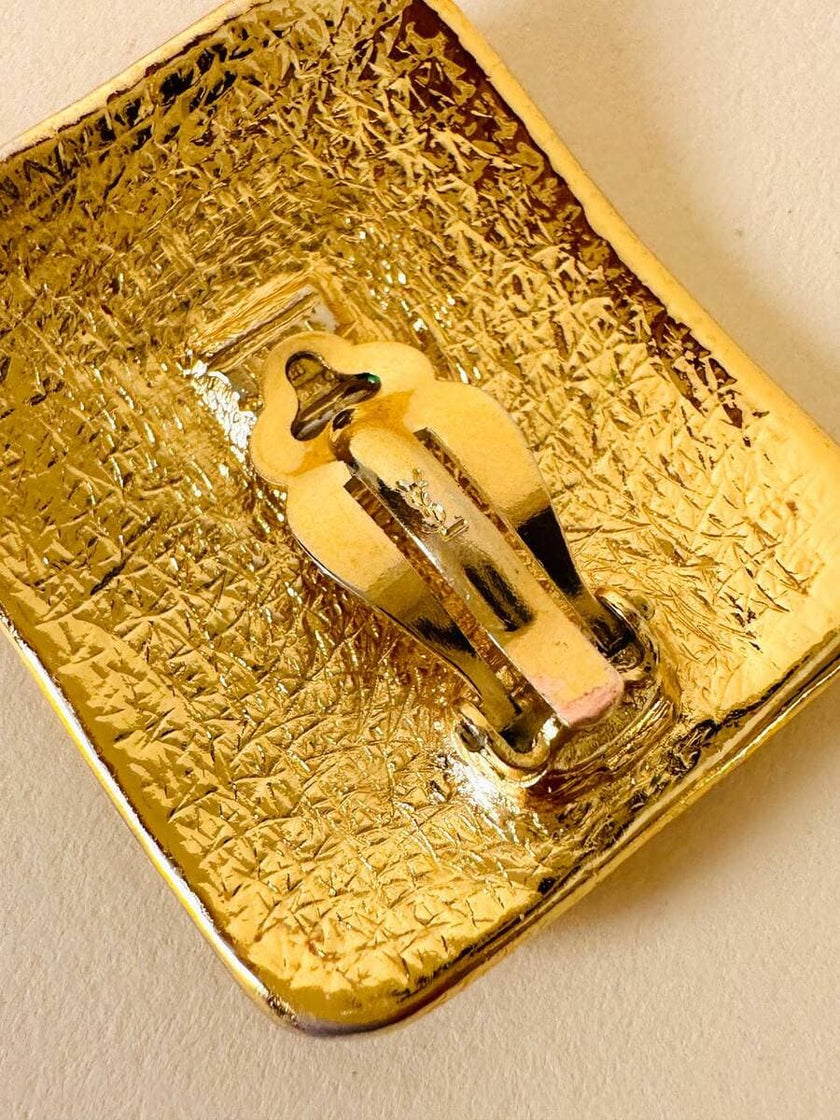 Maxi clip oro con logo “Yves Saint Laurent”