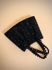 Mini bag di perline nere sfaccettate