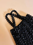 Mini bag di perline nere sfaccettate