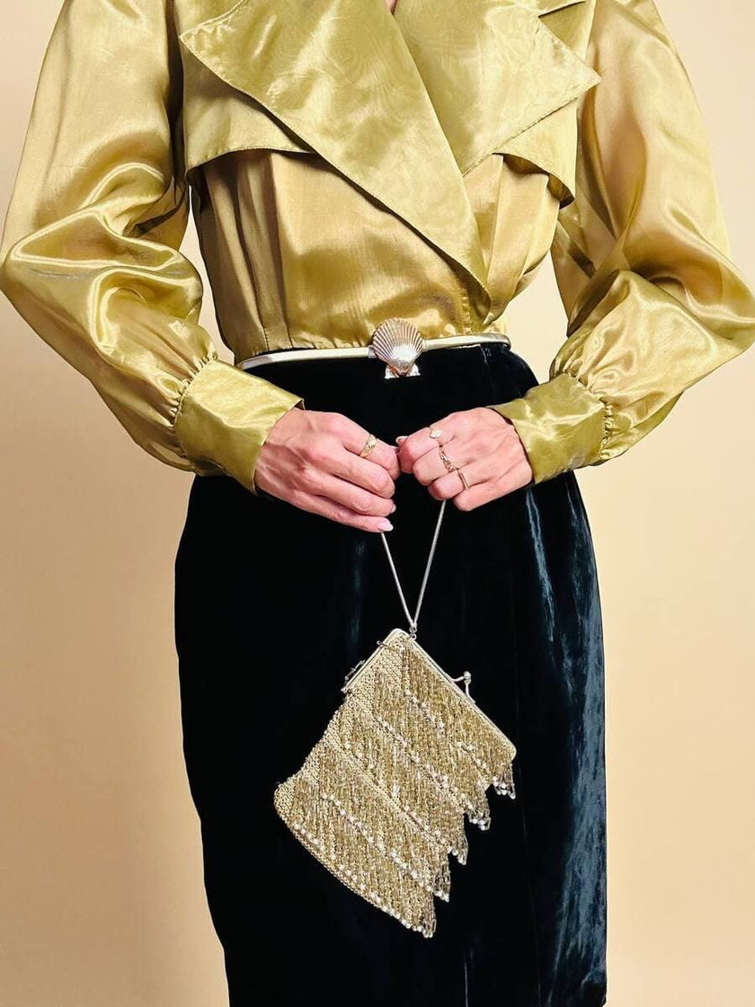 Mini bag in crochet oro con frange di perline