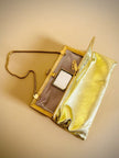 Mini bag in pelle laminata oro con specchietto incorporato