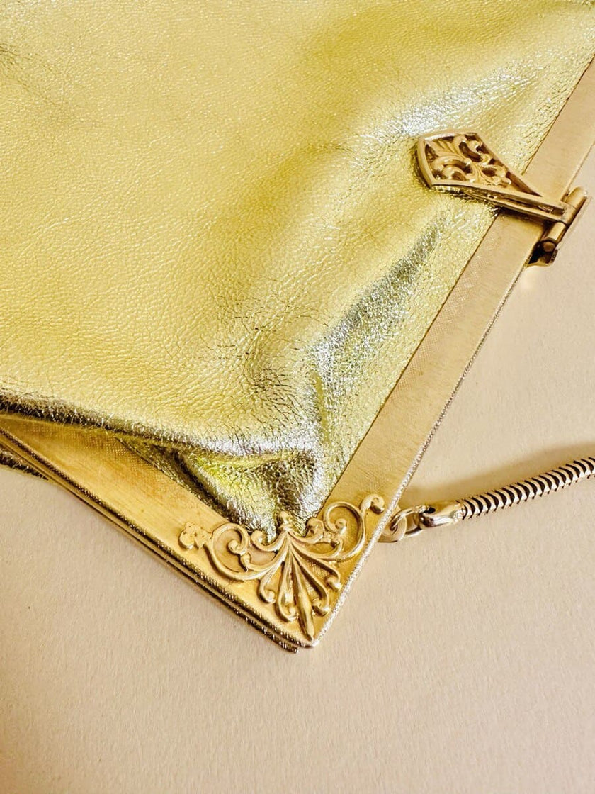 Mini bag in pelle laminata oro con specchietto incorporato