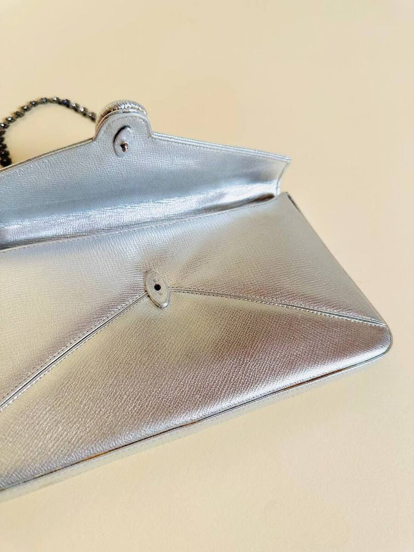 Mini bag in pelle argento con manico gioiello