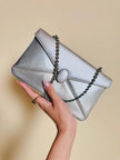 Mini bag in pelle argento con manico gioiello