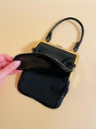 Mini bag artigianale in pitone nero con fodera rossa