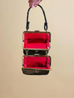 Mini bag artigianale in pitone nero con fodera rossa