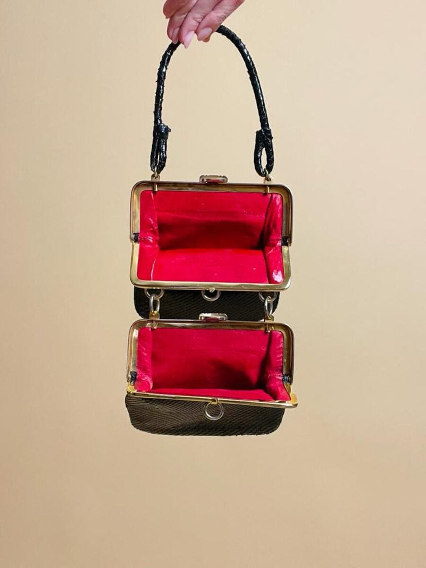 Mini bag artigianale in pitone nero con fodera rossa