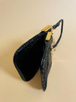 Mini bag artigianale in pitone nero con fodera rossa