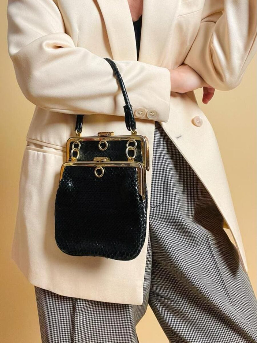 Mini bag artigianale in pitone nero con fodera rossa