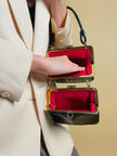 Mini bag artigianale in pitone nero con fodera rossa