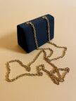 Mini bag a tracolla in raso nero con maxi cuore oro