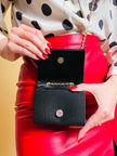Mini bag a tracolla in raso nero con maxi cuore oro