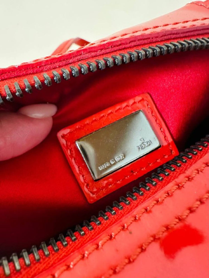 Mini bag in vernice arancione con logo in specchio argento “Fendi”