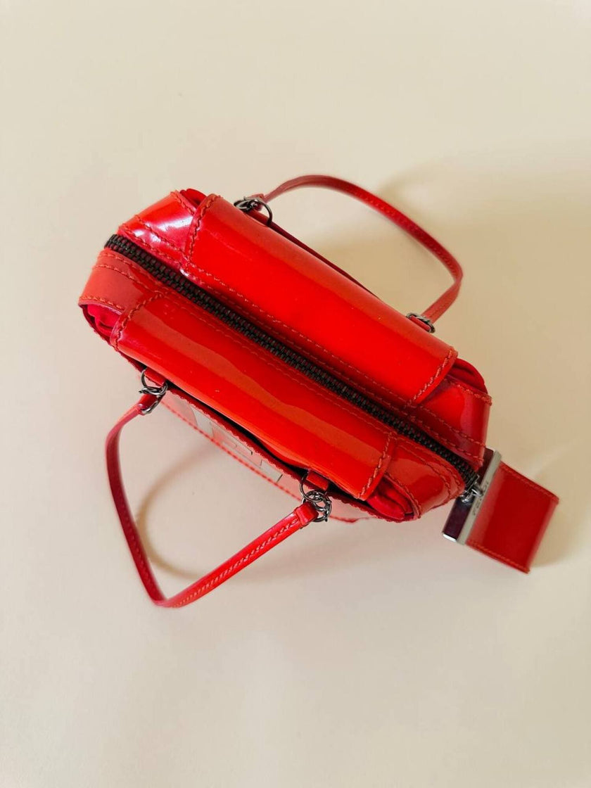 Mini bag in vernice arancione con logo in specchio argento “Fendi”