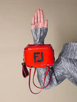 Mini bag in vernice arancione con logo in specchio argento “Fendi”
