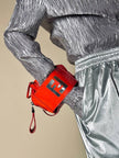 Mini bag in vernice arancione con logo in specchio argento “Fendi”