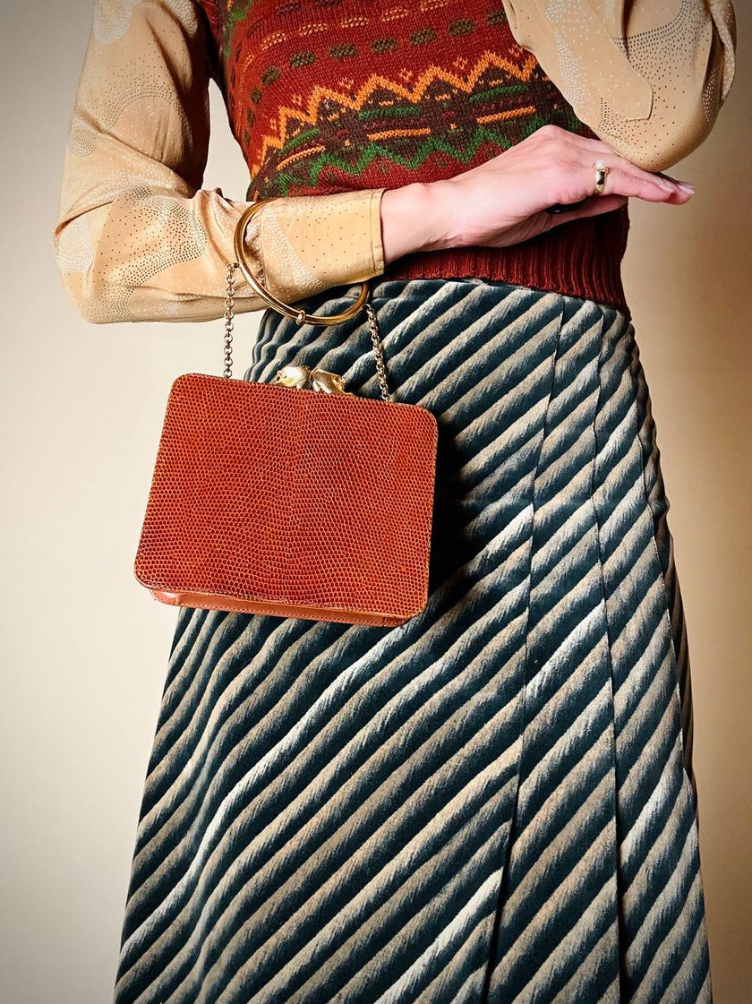 Mini bag in pelle stampa Tejus con manico a bracciale “Salvatore Ferragamo”