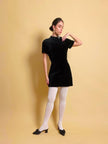 Mini dress in velluto nero con fibbia gioiello