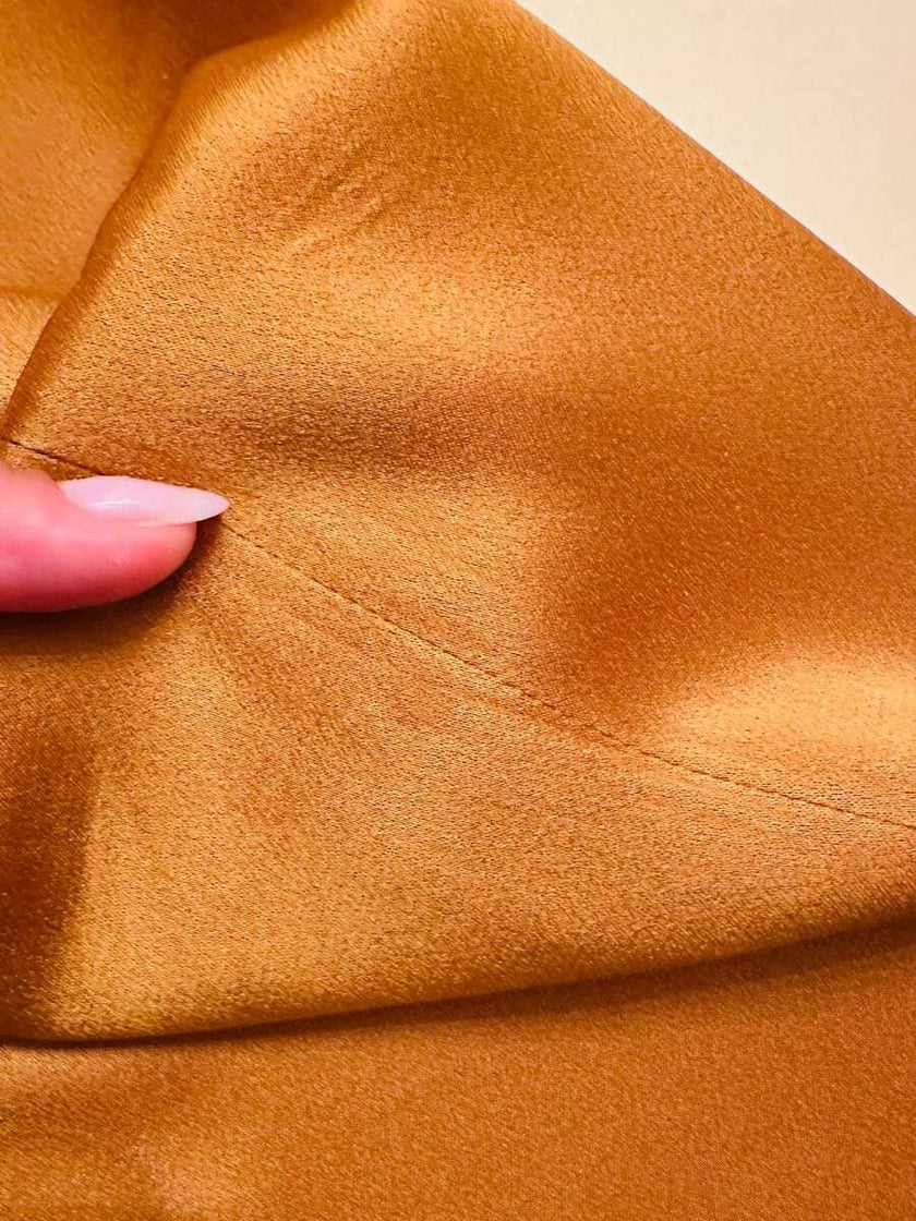 Pantalone a palazzo in cady lucido color ambra 