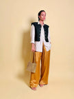 Pantalone a palazzo in cady lucido color ambra 