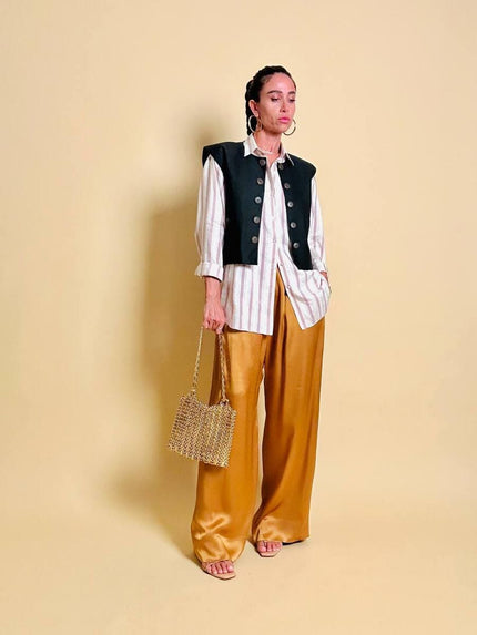 Pantalone a palazzo in cady lucido color ambra 