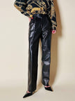 Pantalone in pelle nera con pinces “Oux follies d’Isabel”