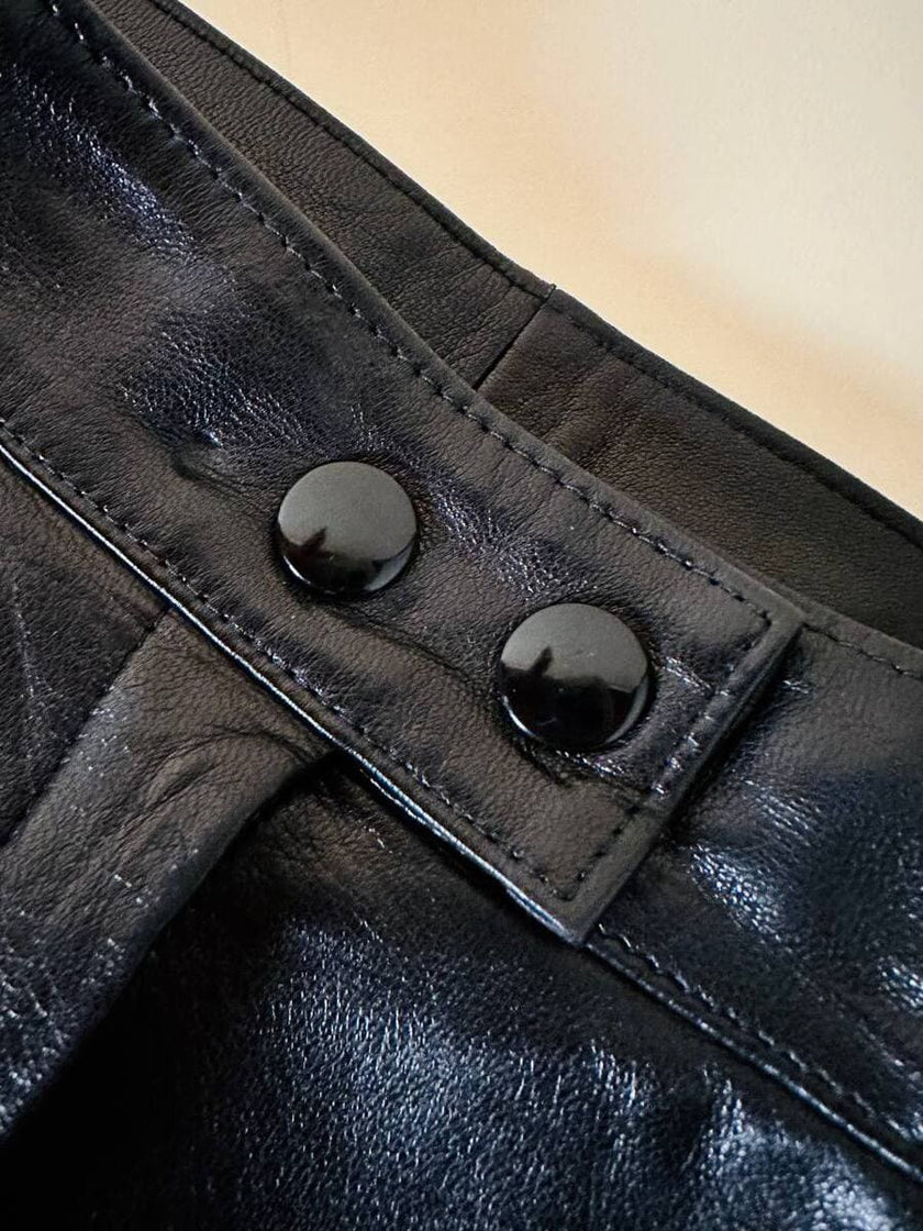 Pantalone in pelle nera con pinces “Oux follies d’Isabel”