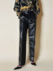 Pantalone in pelle nera con pinces “Oux follies d’Isabel”