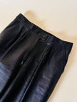 Pantalone in pelle nera con pinces “Oux follies d’Isabel”