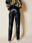 Pantalone in pelle nera con pinces “Oux follies d’Isabel”